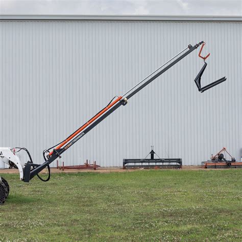 lifting trusses with skid steer|26' skid steer truss boom.